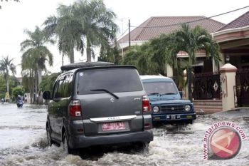 Sungai Musi permukaan naik puncaknya hari ini
