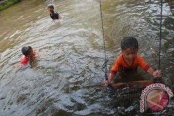 Tanggul Sungai Piji Jebol