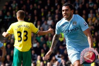 Hatrik Tevez bawa City ke semifinal Piala FA