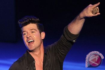  Robin Thicke merajai tangga lagu Inggris selama empat pekan