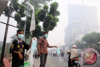 Penjual Masker Asap