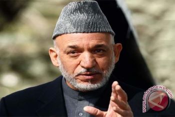  Karzai Menentang Pemecatan Menteri Dalam Negeri
