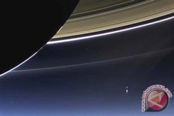 NASA Abadikan Bumi Lebih Kecil dan Pucat