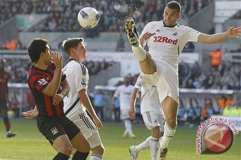 Cardiff boyong Steven Caulker dengan bayaran tertinggi