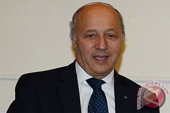 UN Climate talks to last an extra day into Saturday: Fabius
