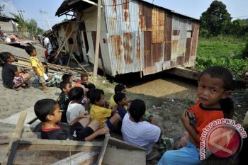 MENGUNGSI AKIBAT TANGGUL JEBOL