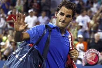 Federer Kalahkan Tsonga Untuk Capai Perempat Final