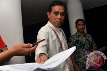 TERSANGA KORUPSI BANSOS
