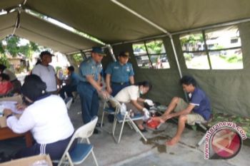 Lantamal VI  Manado bantu korban bencana Manado