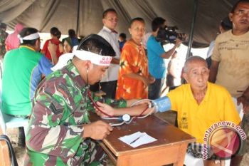 Korem lakukan pengobatan  korban banjir Manado 