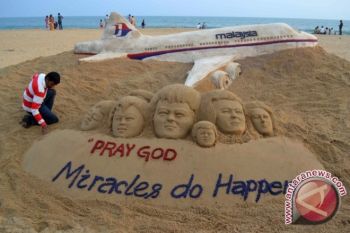 Cuaca Buruk Halangi Pencarian MH370