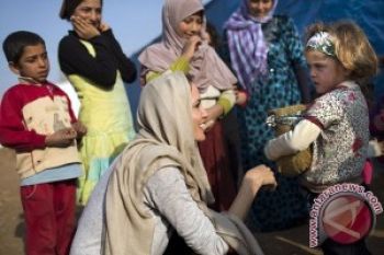 Rombongan Pertama Pengungsi Suriah Tiba di Inggris