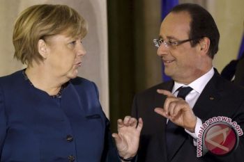 Merkel dan Hollande Sangat Cemas Kekerasan di Ukraina