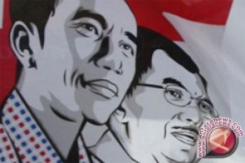 Relawan Jokowi-JK Jateng Serentak Pakai Pita Kotak-Kotak