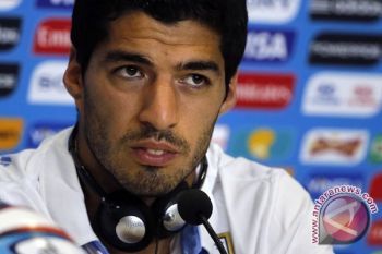 Larangan Bertanding Untuk Suarez "Berlebihan"