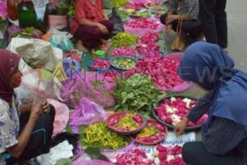 Penjual Musiman Bunga Tabur