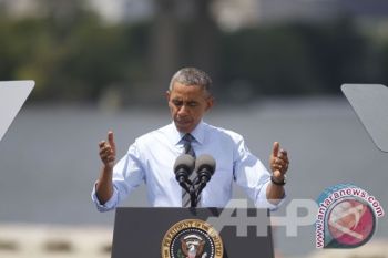 Liburan Obama Tak Berubah Setelah Serangan Udara Di Irak