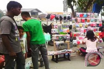 Penjual Masker "Menjamur" Manfaatkan Kabut Asap