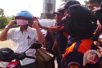 Dinas Kesehatan bagikan masker kepada pengendara
