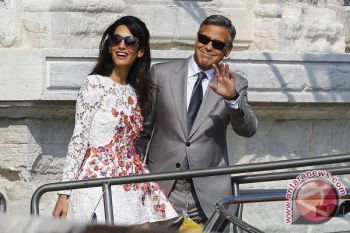 Amal Alamuddin Kerja Lagi Setelah Nikahi Clooney