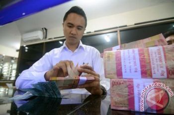 Rupiah Menguat Jadi Rp12.335 per Dolar
