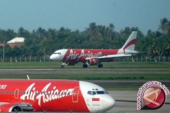 AIRASIA Batal Terbang Akibat Tabrak Burung