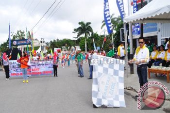 Ratusan Warga Meriahkan Carnaval Di Muara Teweh