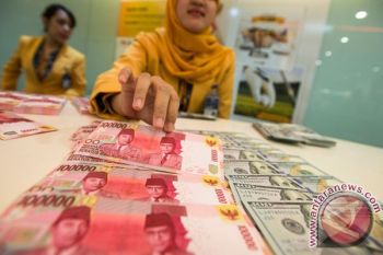 Rupiah Melemah Jadi Rp14.015 per Dolar AS