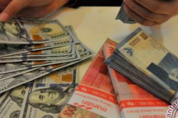 Jumat Sore Rupiah Ditutup Naik Tipis Menjadi Rp13.987 Per Dolar