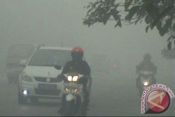 Sekolah di Kobar Diliburkan Karena Pekatnya Kabut Asap