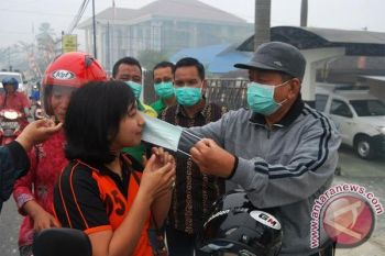 Dinas Kesehatan Barito Utara Bagikan Masker
