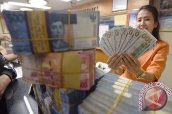 Rupiah Bergerak Naik ke Rp14.320 per Dolar AS