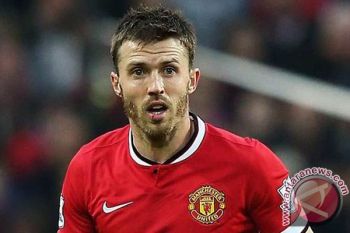 Carrick absen saat MU lawan VfL Wolfsburg di Liga Champions