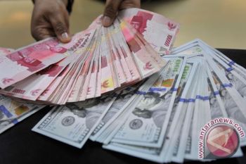 Rupiah Melemah Menjadi Rp14.699 per Dolar AS