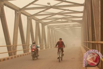 Kabut Asap Di Muara Teweh Masih Tebal