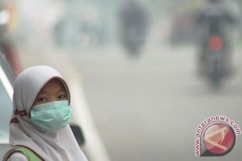  Bencana Asap - Guru Minta Ujian Nasional Ditunda 