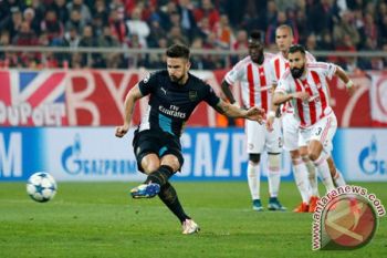 Trigol Giroud bawa Arsenal ke 16 besar