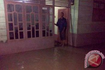 Permukiman Warga SP3 Tiumang Dharmasraya Terendam Banjir