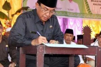 Bupati Inhil Hadiri Acara 1000 Telur di Tanah Merah