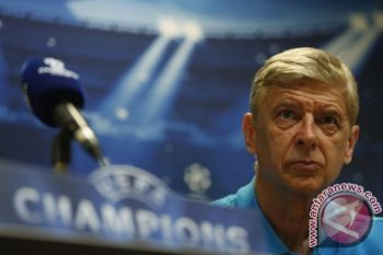 Wenger Akui Barca Lebih Baik