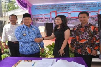 Bupati Lampung Tengah Tandatangani Perjanjian Pembangunan Pasar Bandarjaya
