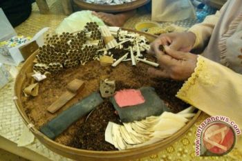 Kemas Secara Tradisional