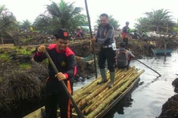 Cegah Karlahut, Polres Pelalawan Bersama Masyarakat Bangun 100 Sekat Kanal 