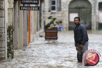 Prancis Janjikan Bantuan Bagi Korban Banjir