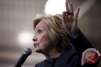 Serangan Orlando, Tunda Kampanye Bersama Obama dan Clinton