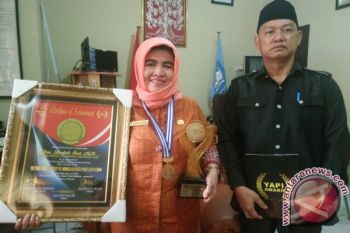 Sosok - Dra Badah Sari MM, Disiplin dan Kerja Keras