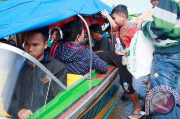 Puncak Arus Balik Melalui Sungai Barito Minggu