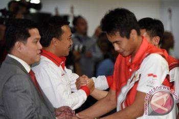 Menpora cukur rambut jika Owi-Butet dapat emas