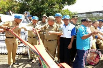 Distan bagikan 100 unit alat mesin pertanian