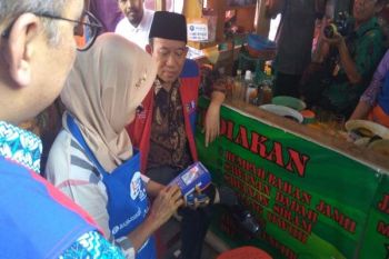 Transaksi Nontunai Dorong Efisiensi 